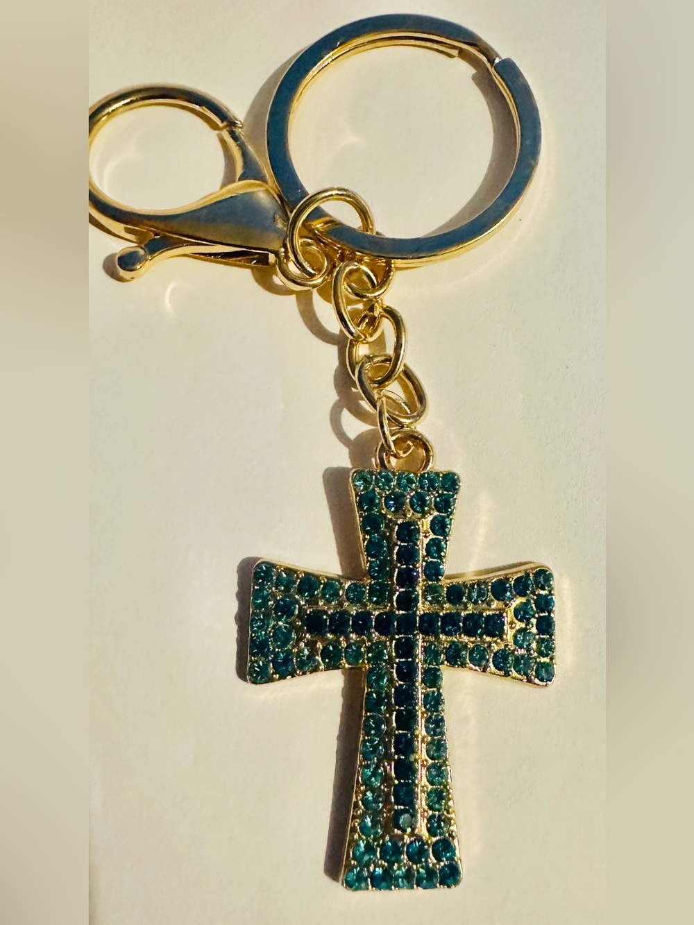 Gold Tone  Cross Keychain with Blue Crystal Accents